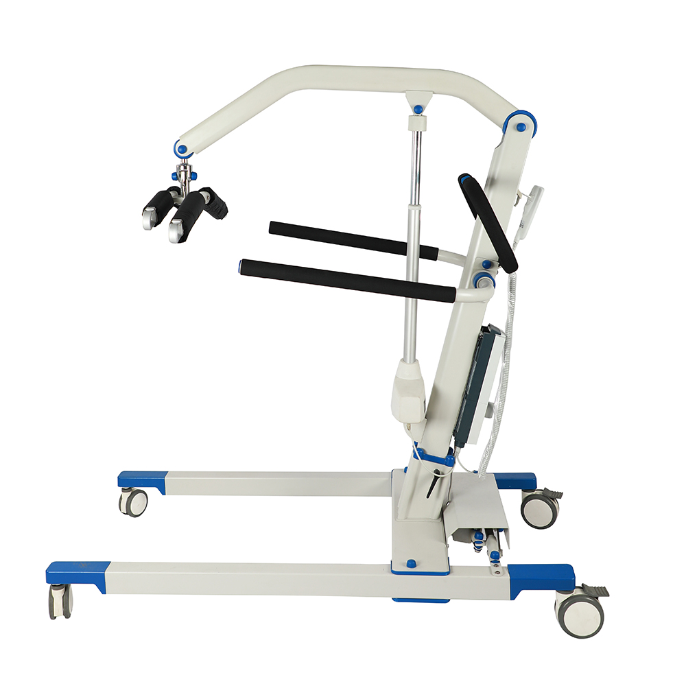 A caregiver preparing a patient for transfer using a mechanical patient lift in a clinical setting